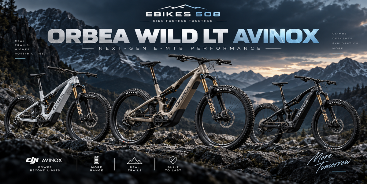 Three EBikes 508 Orbea Wild LT Avinox mountain bikes displayed on a rocky mountain peak with snow-capped peaks in the background. The image features promotional text, branding for EBikes 508, Avinox, and DJI, and a 'More Tomorrow' slogan.